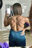 Let me start by saying if you have an issue with getting your clothes tailored, this may not be the piece for you. BUT if you don't mind getting an a inch taken here, or a hem there, this is the one for you! It fit a pinch large so I ended up getting it tailored (taken in in the waist & legs, & hemmed) & girlfriend, this was a HIT! I wore this for a friend's wedding & got compliments from the start of the evening to the very end. I do have two cons. 1) Since the straps are elastic, they didn't stay in place like the picture (which isn't a deal breaker for me). 2) Because of the material, sweat shows easily. Again, not a deal breaker but something to be mindful of if you're buying this for a special occasion. Instead of wearing a bra I used pedals & body tape. - Chelsea P.