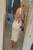 This dress has a beautiful back detail that keeps its shape but is NOT made for a 5'2 girl. I ordered an XS size knowing it would be a tad long but the dress went past my calf. There is no way to wear a bra or underwear without it being seen as well. You need, however, to wear a bra with this dress due to little to NO support up top! Would NOT recommend it. You can see every bump, lump, and line due to the thin material. Sending back and not ordering this dress again! - Morgan G.