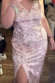 This dress is everything!! The color is stunning and the material is too. It was just a little too long on me since my height is 5'0" and a little loose on the waist for my preference but other than that this dress is pretty cute. - Karilyn R.
