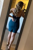 This dress is made nicely, but there should be a zipper on the side or back for ease of putting it on and taking off.  It does stretch, so that helps.  Because it's a body con dress it's very form fitting and tends to ride up a little when I walk and I find myself pulling down on my thighs ever so often.  The fit and style of the front is very flattering, and the length is perfect and sexy.  I would definitely buy this dress again. - Lisa F.