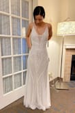 This dress is a show stopper to me, I love it so much. Unfortunately, it fits me a full size too large, and its completely out of stock at the moment, so exchanging for a smaller one is not an option and I think having it altered would be too much. The length is great for a wedding in my opinion, I am wearing 2.5 inch heels and still reaches the floor.
If you see this dress and its in your size, don't even think about it, go for it! - Alma R.