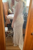I loved this dress so much! But it does not work on my body type. The print makes me look short. It looks great from behind, but awful from the front (on me). The material is nice and thick. I would not want to wear it for hours outdoors in August, which is when my wedding will be. - Lilly M.