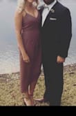 This dress is so flattering, fun to wear and really comfortable! The color is gorgeous. - Lauren M.