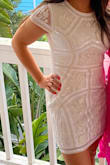 Medium fit great. Wore this dress on my bachelorette and received a lot of compliments. I was comfortable and material was breathable. Beautiful beaded design. - Emily G.