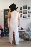 I was in love with this dress online. The open back and the train is amazing, but I didn't love the front middle slit or the neckline in person. In the end I decided on another Lulus dress (Remarkable Moment White Floral Embroidered Lace-Up Maxi Dress) which really felt like higher quality materials, and a bit fancier. It depends on what you want. - Lindsay L.