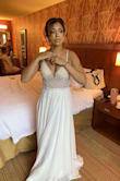 This dress was absolutely perfect! Seriously don't hesitate to buy it! The fit was true to size I got a size 6 and had to get not one alteration! I can't tell you how many compliments I got one this dress! For this price and the quality of the gown you literally can't pass it up! The beading is legit and the material is very better than you probably expect! I loved this dress so much I can't say one bad thing about it! - Skylar W.