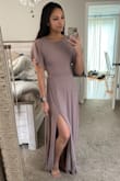 I absolutely love this dress! I bought this as a bridesmaids dress and honestly I didn't even shop around for options because as soon as I saw this dress, I knew it was the one. I like that it's not super revealing, but also has a flirty aspect to it with the slit and slightly open back and sides.
I do agree with other reviews that it's extremely long. It's basically made for people who are 5'9", otherwise you will need to get quite a few inches hemmed off. I am normally a size xs/s and the xs fit perfectly. In fact, I still had some room to breathe.
My only other con about this dress, besides the length is the zipper. My husband thinks it would have been better had it been a hidden zipper. I agree that a hidden zipper like the side zipper probably would've been more attractive, but it doesn't bother me the way it is. However, it is hard to zip up. It seems like a cheap zipper. But other than that, I still love this dress! - Athena B.