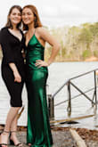 I absolutely loved this dress, it was perfect for my sorority formal and I got so many compliments on it! It fit so perfectly and it was extremely flattering. I didn't need to get it hemmed, as it was long enough to cover my feet even with heels on. Definitely recommend! - Emma C.