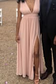 Ordered the blush color in a small. I am 5'9 145lbs and 34D for reference. The dress touched the floor even in 4-inch heels. It was the perfect fit! Did not have to alter in any way. The waist area was the perfect amount of tightness to keep the girls up. However, I did use boob tape for support. Wore this dress as a guest to a wedding. Everyone complimented me! - Lorena R.