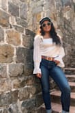 Wore this to a castle winery and I loved it so much. Perfect mixture of casual and dressy. I did have to steam it before wearing it bc it does wrinkle. Even with the back cut out you can still wear a bra perfectly fine with it. - Pechiney S.