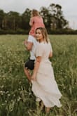 This dress was perfect for our family photos. I will need to wear a more low cut bra next time but I have so many compliments on this dress, it's insane. - Ashton T.