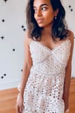 This is the absolute perfect dress for Spring. It'd say it's more ivory than blush pink, but it's a stunning dress. Perfect to pair with chunky black boots and a motorcycle jacket for a more bold look or with nude/white heels for a classic look. Highly recommend and have gotten many compliments on it. - Sarah C.