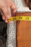 The description says "ankle length" although they do not look ankle length in the pictures which was fine because I didn't want ankle length pants. HOWEVER, I also did not want pants 3 inches too long. Am I being punk'd? Because I don't see how these could fit properly on anyone with a 33 in inseam. Did I get a defective pair?? The pants themselves are nice and fit well around the waist but what is going on with the length?? Why did no one mention the ridiculous length?? - Griselda M.