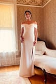 I wore this dress for my courthouse wedding in Minnesota. And it was perfect! It looks elegant with a sexy touch. I combined with a faux fur wrap due the cold weather. The price is amazing! I did not find anything like this in other stores. - Angie P.