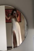 Fits pretty much perfectly, ever so slightly loose around the waist but leaves room for dinner haha. Material is stunning and very well made and I especially love the straps - they're such an elegant detail. Sometimes dresses can be too short for me because I'm quite tall, but the length is perfect.  Overall, absolutely love it. - Mia P.
