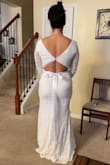 Lovely dress and was great quality. Lace was beautiful and looked like it was from a boutique. I have broad shoulders so it was not a fit on the top section, but I highly recommend it! - Cathy C.