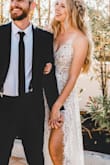 I got this dress for a redo on my wedding pictures for our 10 year anniversary since we didn't get real pictures for our original wedding. I LOVED this dress more then my original expensive dress!! My husband was also obsessed! When we posted pictures all anyone could talk about was the dress. It's completely see through with like a nude leotard that's slightly up your butt, so if it's not a beachy outdoor wedding it may be odd, but I loved it. I'm almost 5'10 and I was worried it would be short as is most things but it was perfect. - Caitlynn D.