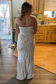 This dress fit me perfectly. I am typically between a small and a medium depending on the brand. I ordered a Medium and I don't even need to get it hemmed! I am bare foot in the picture, my shoes add a little height. The quality is 100% and looks far more expensive than the price. It looks so much better in person than in the online picture. Highly suggest. - Katherine R.