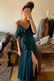 The dress is perfect, I still haven't used it yet to the event but it fits perfectly, it fits comfortably and its tight in the right areas but loose in the hips (I have big hips). I also have a small breast so I had no problem with the cleavage. Love it! Can't wait to wear it to the wedding! - Tania G.