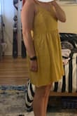 I like this dress a lot. The material seems sturdy and is breathable. The cut is a bit babydoll-ish because of my chest, but I don't mind that. I like that you can machine-wash it. Looks super cute with brown sandals and a denim jacket. Would buy this dress again. - Jenny B.