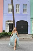 I love this dress. It's so pretty and flirty. The back straps allow you to adjust it to your bust size. I'm 5'2" so I had to take it to the tailor. I got this dress on sale so didn't mind that I had to do extra work. - Lena M.