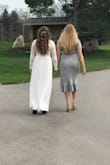 Absolutely love this dress! I wore it for my bridal shower and received so many compliments on it! Planning to wear it again for my rehearsal dinner. Not too heavy, but the material feels like it's good quality. I am 5'10" and ordered the large. It touched the ground when I was barefoot so I wore heels to keep it from dragging. - Racquel S.
