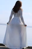 What a beautiful dress that helps show off my curves! - Katie S.