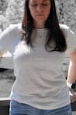 Fun white t-shirt. FITS PERFECT! The sleeves are the right length, so is the shirt in general...length hits just below the waist allowing you to tuck or leave free. Will be getting more in different colors. - Angela B.