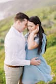 The color of this dress is stunning and the fit is very flattering! It looked absolutely fabulous in my engagement pictures and my photographer said it photographed very well! Would absolutely recommend this dress. I have a regular sized bust and larger hips so this dress fit nicely if you're a similar size! Probably could've fit a medium but I like the extra length a large gives. - Amanda R.