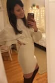 I love this sweater dress. It's form fitting at the bottom but loose at the top, giving it the appearance of being two pieces. The length not too short and not too long. - Jacqueline B.