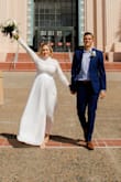 I am 6 months pregnant and decided to have a courthouse wedding. I bought this dress for the wedding along with countless others but ended up going with this one! I did have to make alterations because I'm bigger than I normally am, otherwise I believe it would have fit perfect. I had an inch maybe taken off the bottom, I had the back zipper let out so that it would zip, and for my own taste I had the slit taken much higher up my leg (I have short legs so the slit was not high enough for me) it turned out great! - Christina W.