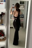 Fits perfectly! Love the open back and the knot detail. I'm 5'7" and this was the perfect length with a pair of shorter heels. - Thea Z.