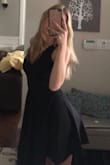 This dress fits in all the right places, if you are worried about the front being to low, it isn't in any way! Love this dress - Nicole K.