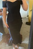 I would size down. The dress bunches in the hips making it an unflattering fit. The bust is very comfortable. Hope the xs isn't too tight. - Kendra T.