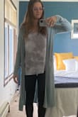 I absolutely love this shirt. It runs bigger than expected, but it's easy enough to tie in a knot or tuck in. It's the perfect cute, casual shirt!  One photo shows it tucked in, the other is untucked. - Madie H.