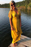 This dress made me love wrap dresses!! I love the color and the fit! It looks good on me whether I am tan in the summer or not. I get compliments whenever I wear this! The only complaint I'd have is that it wrinkles easily... but it's so worth it! This dress is gorgeous! - Kristin V.