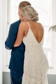 I love this dress so much. It was the first and only dress I tried on and I had my doubts about it because of that but when my wedding day FINALLY came it was perfect and everyone loved it!! I have seen a lot of people say they got this dress for an elopement but I got it for my normal, small family wedding and it was great. I did alter the back to lower the V in the back and added some buttons from Amazon and had it hemmed. It was comfortable all day and looks beautiful in pics! And can't beat the price!! 10/10!!! - Dhrew M.