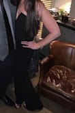 This jumpsuit was AMAZING but definitely a little long and I'm tall, I had to wear heels! The bust was a little loose but not too loose. I added a sticky bra and it fixed the problem. I wore to a wedding in Vegas. - Leah C.