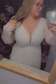 This dress fits amazingly and is absolutely beautiful! The split in the dress adds that extra touch too! - Alexis E.
