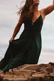 I ordered this for our engagement photo shoot on a summit, and it couldn't have been a better fit for the dramatic landscape. The slit does go WAY up so there were some scandalous moments with the wind, but I don't imagine most people hike a mountain on a windy day in the dress. I'm 5/2 and it was only a little too long for walking. I will say the thin straps on a decently heavy dress started to get a little uncomfortable at the end of three hours, but it was worth it. My photographer gets a lot of amazing credit (@kmm photography LLC). I also loved the customer service. The shoot ended up coming together a bit last minute, so I ordered six dresses at once. They got here in time, tried them on and returned all but this one. The credit came through quickly. - Susanna S.