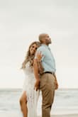 I love love love this dress!!! It is even more gorgeous in person!!!! The quality is amazing!!!!! I can't say enough but I can't wait to wear this dress again at my rehearsal dinner. - Crystal H.