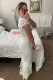 The dress it a fitted dress. Looks better in person. Love the mermaid style! - Lacie B.