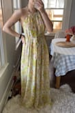 I could definitely take an XS in this but tbh I was too impatient to wait for it to come back in stock. The ties on the dress allow for a customizable fit so the extra room in the Small isn't a big deal. I'm just a bit over 5'4 and the length will be perfect with heels! I personally love the totally open back. - Kyra C.