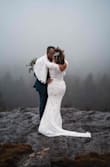 I saw this dress online & loved it immediately! However there are SO many other beautiful dresses available I ordered more & returned them all as they didn't compare to this one! It was perfect for my mountain elopement! Ordering was easy, the dress arrived in a week with its on black dress bag. Bc I'm short the only thing I had to alter was the length [a little]. I also the tan lining sewn to the lace & it made a huge difference & I'm glad I did bc it was very windy on the top of a mountain! - Kelly H.