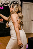 Loved this for my wedding gown! You would have never guessed it was from Lulus. The dress has a bit of sparkle that doesn't come through in the stock photos so it's definitely more beautiful in person. The back is also sexy. Also, there's no stretch so beware. - Cynthia M.