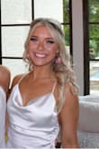 I am absolutely in love! I wish I could live in this dress. It was the perfect statement piece for my senior prom! Runs large so I had it altered but that was fine with me! The material is so nice and incredible soft and comfortable. I want to be buried in this dress. - Heather D.