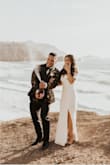 I loved this dress for my backyard elopement.
I wanted something to cover my arms and this dress was elegant enough to do so! I had to get it hemmed at the bottom a bit because it was a little too long, but other than that, I loved it! - Mary T.