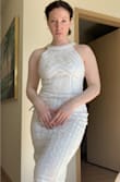 I love this dress! I bought a size small, as often times Lulus dresses have some stretch to them. I definitely needed a size medium instead, this dress is quite structured, and very lovely! The beading and embroidery are beautiful in person. I don't have enough time to process an exchange, as I need the size medium ASAP. I will be returning the size small. I can't wait to wear it as my wedding reception dress. I took the pictures at night, they don't do this dress enough justice. The dress pictured is the Medium! - Leah T.