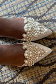 These flats are absolutely gorgeous. I bought them for my wedding. However, they are not true to size. They run small. Order up half a size or whole if half sizes aren't available. - Berline P.