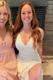 Loved the material, loved the style, but wish it fit more true to size. I'm rather petite at only 5' tall, and I am usually an XS. I have DDD's and prefer my dresses tighter fitting so they hold my boobs up, and I found myself needing to adjust pretty frequently. Despite being a little big, it was so cute that I kept it anyway. It was perfect for my bridal shower! I got so many compliments on it. - Bethany B.